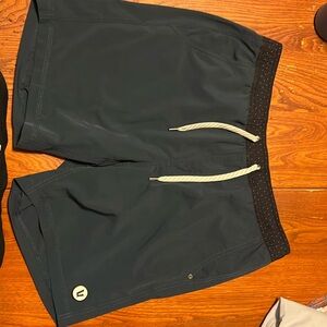 dark gray blue Vuori Kore shorts